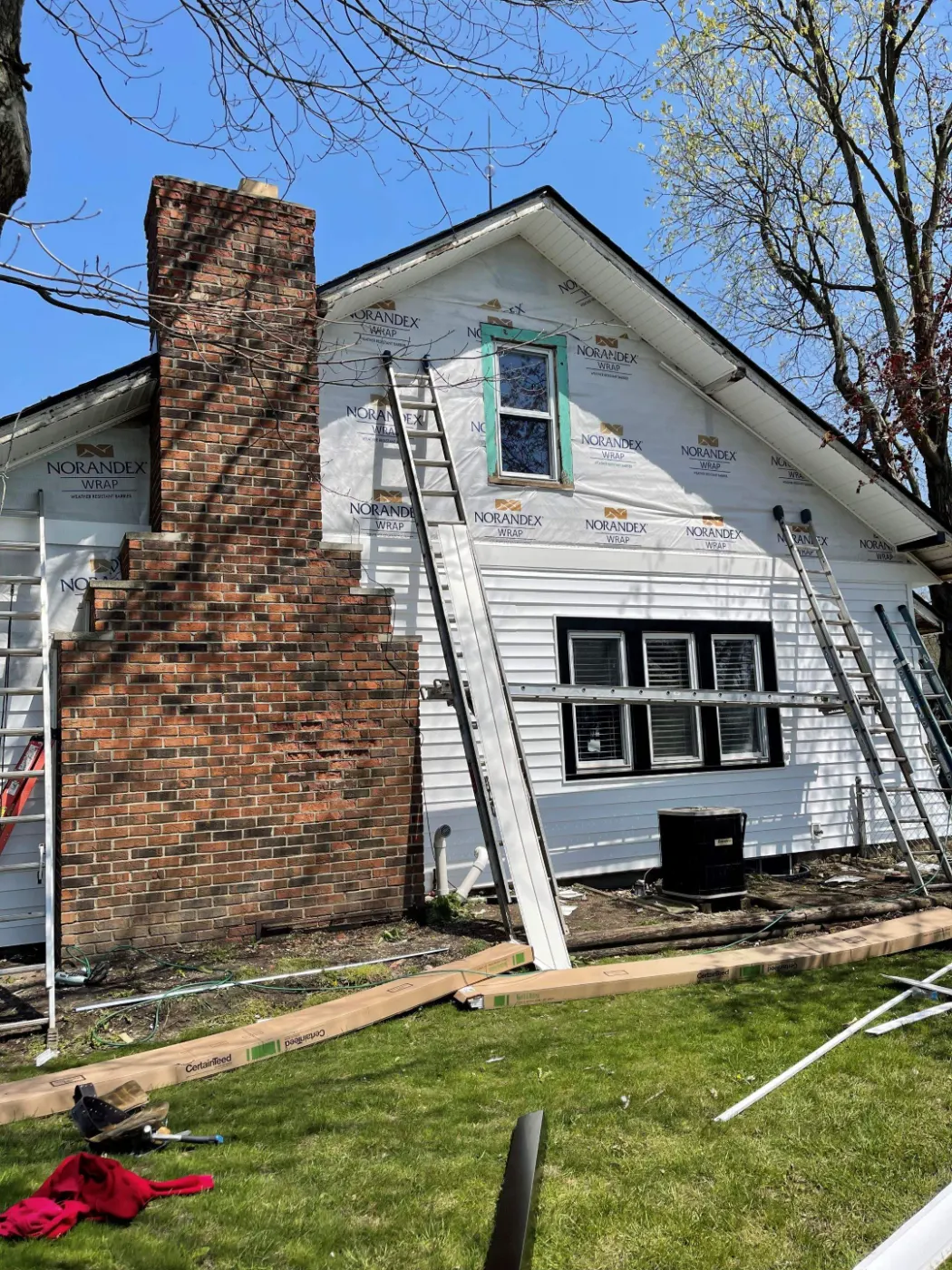 Fiber cement siding installed on a Holliday Park home